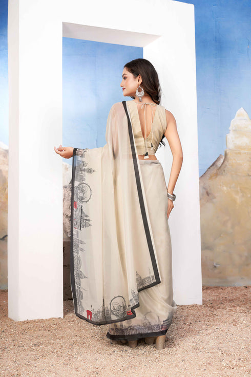 Elegant white creamy Georgette Saree with monuments Design