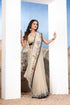 Elegant white creamy Georgette Saree with monuments Design