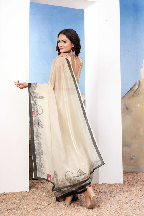 Elegant white creamy Georgette Saree with monuments Design