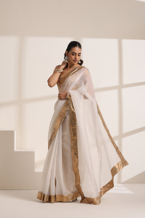 White Organza Saree with Golden Lampi Lace Border