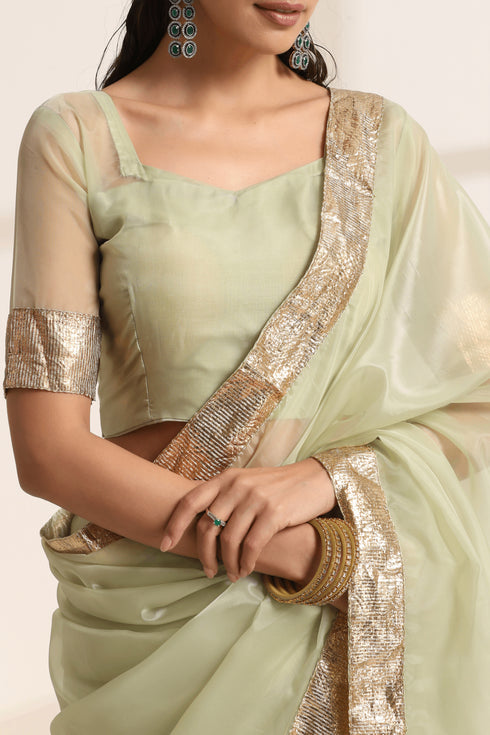 Green Silk Organza Saree with Golden Zari Border