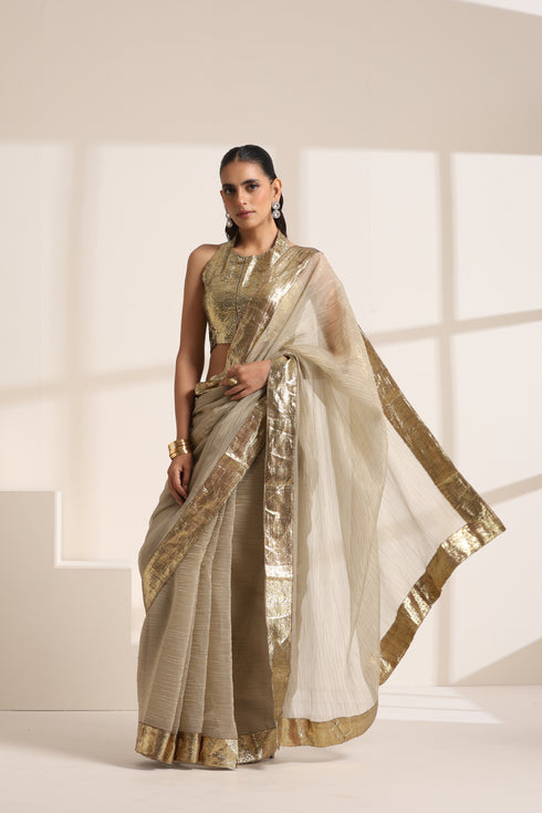Ivory Saree With Golden lace And Crush Fabric