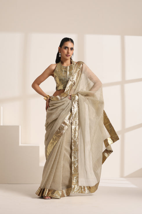 Ivory Saree With Golden lace And Crush Fabric