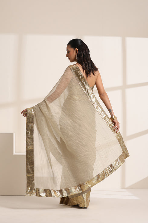 Ivory Saree With Golden lace And Crush Fabric