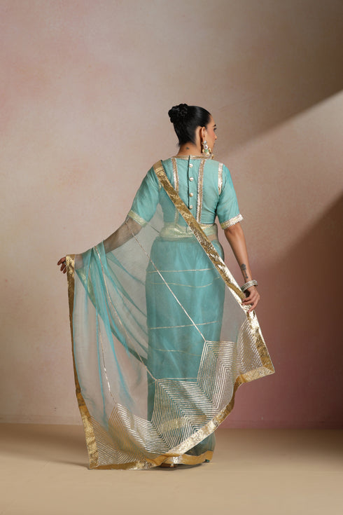 Sea Blue Organza Saree with Gold Lampi Lace Work