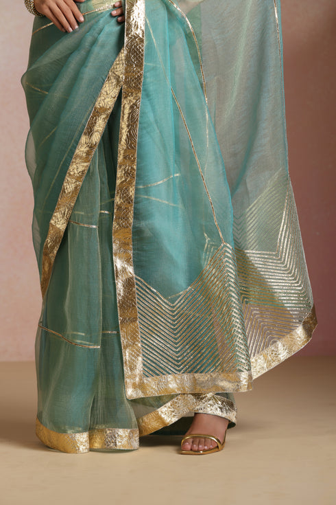 Sea Blue Organza Saree with Gold Lampi Lace Work