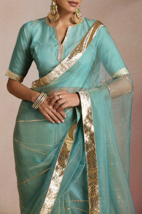 Sea Blue Organza Saree with Gold Lampi Lace Work