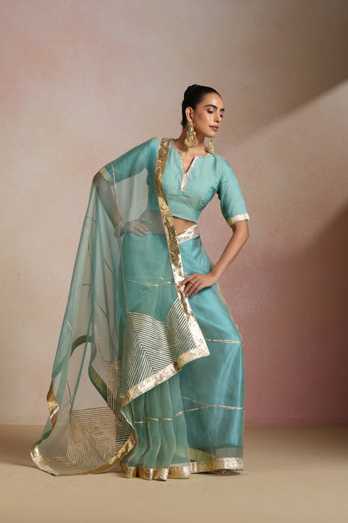 Sea Blue Organza Saree with Gold Lampi Lace Work