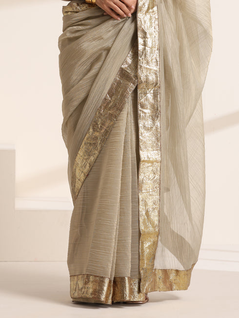Ivory Saree With Golden lace And Crush Fabric